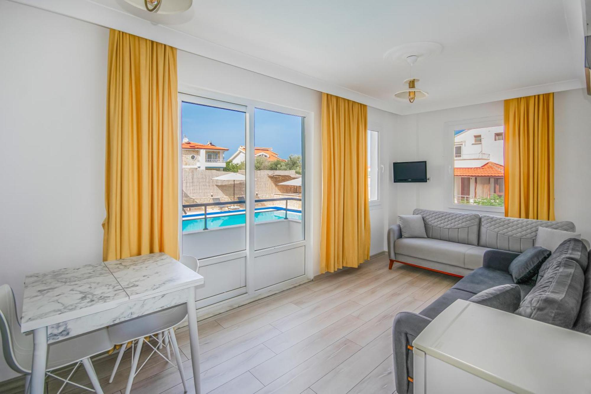 Oezguem Suite Otel Datça Buitenkant foto